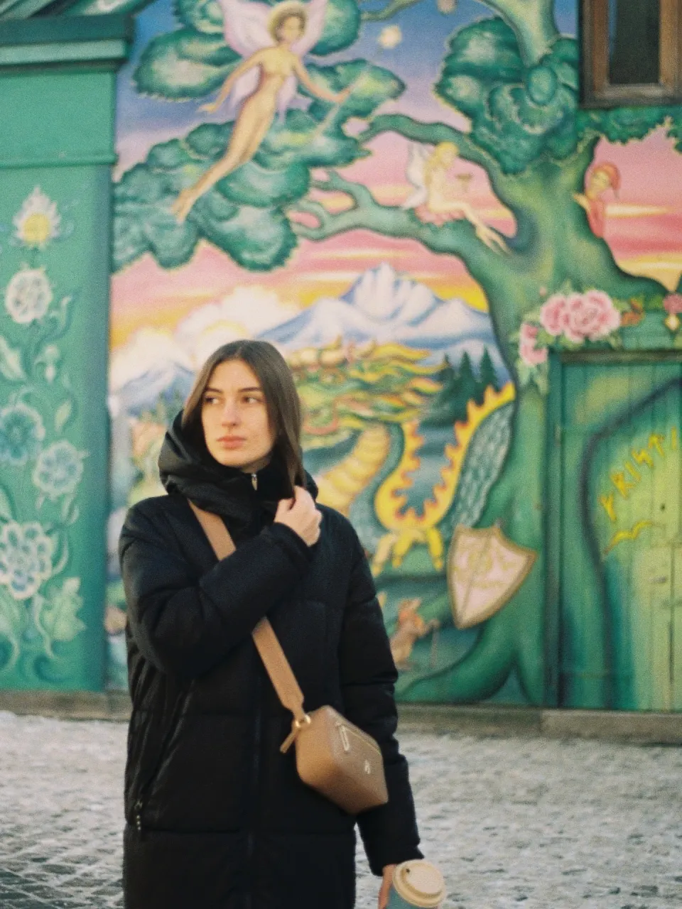 Portrait in front of a colourful mural in Christiania, 35mm film