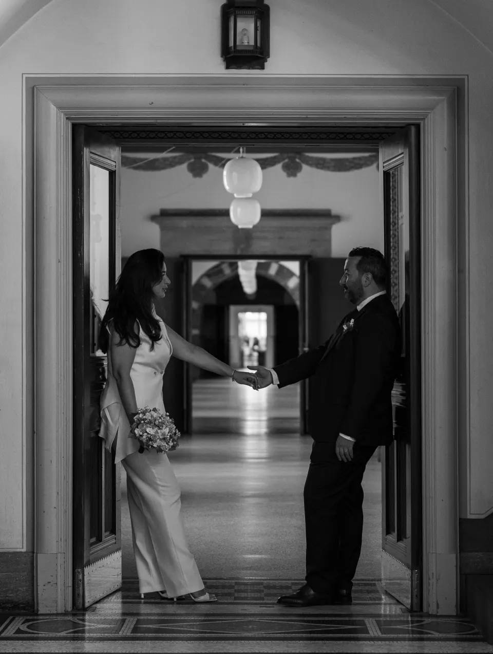 Bride and groom in the halls of Copenhagen City Hall